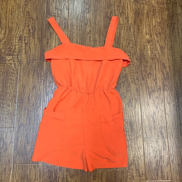 orange romper jumpsuit